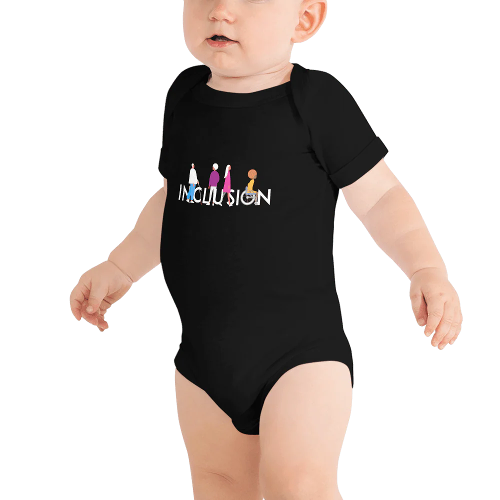Baby wears black baby grow which says Inclusion with people figures